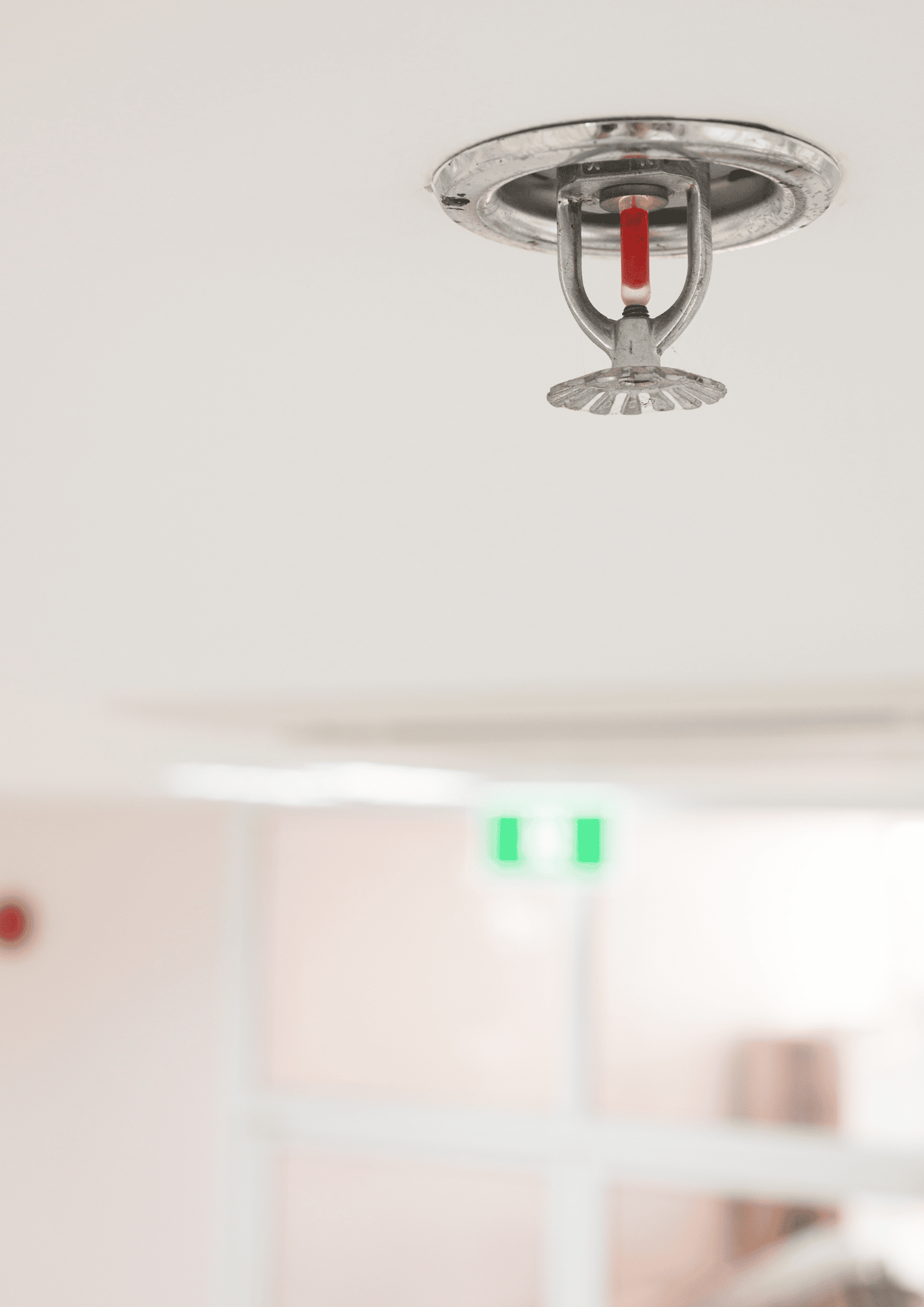 Sprinkler system in ceiling positioned right